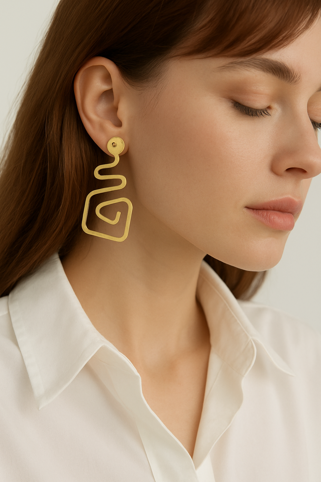 Golden Spiral Elegance Earrings Garud Wear